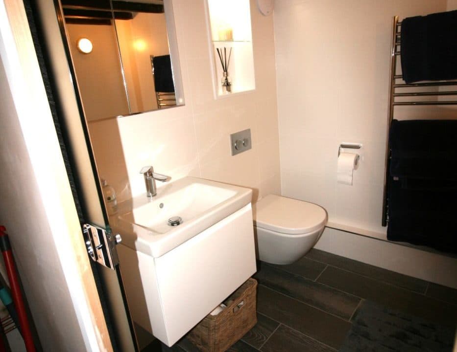 contemporary bathroom for a beamed cottage