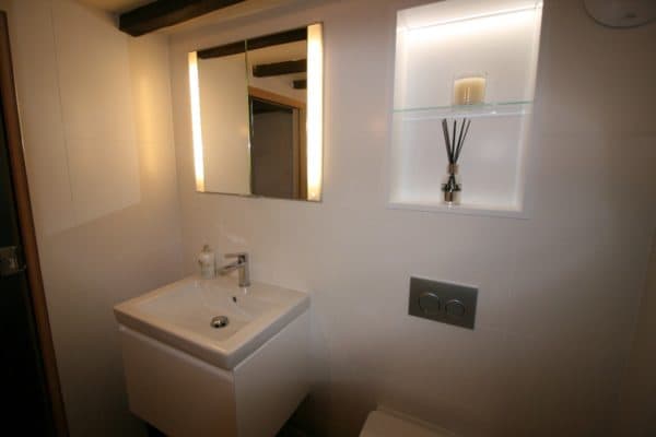 contemporary bathroom for a beamed cottage