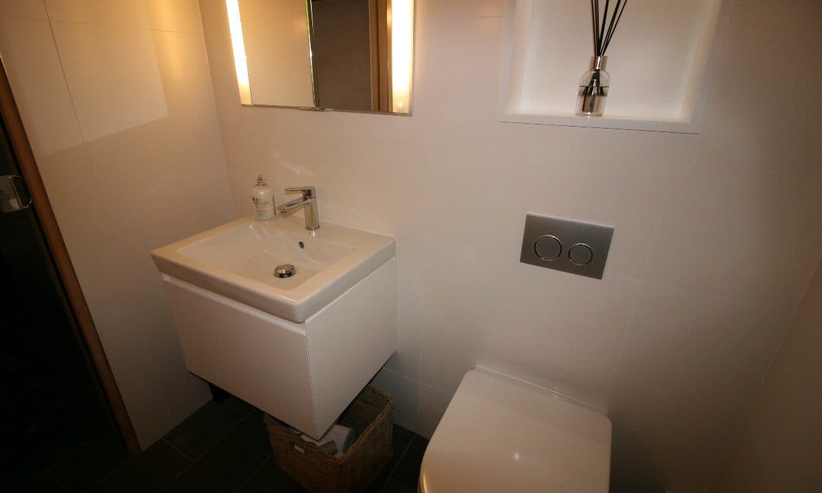 contemporary bathroom for a beamed cottage